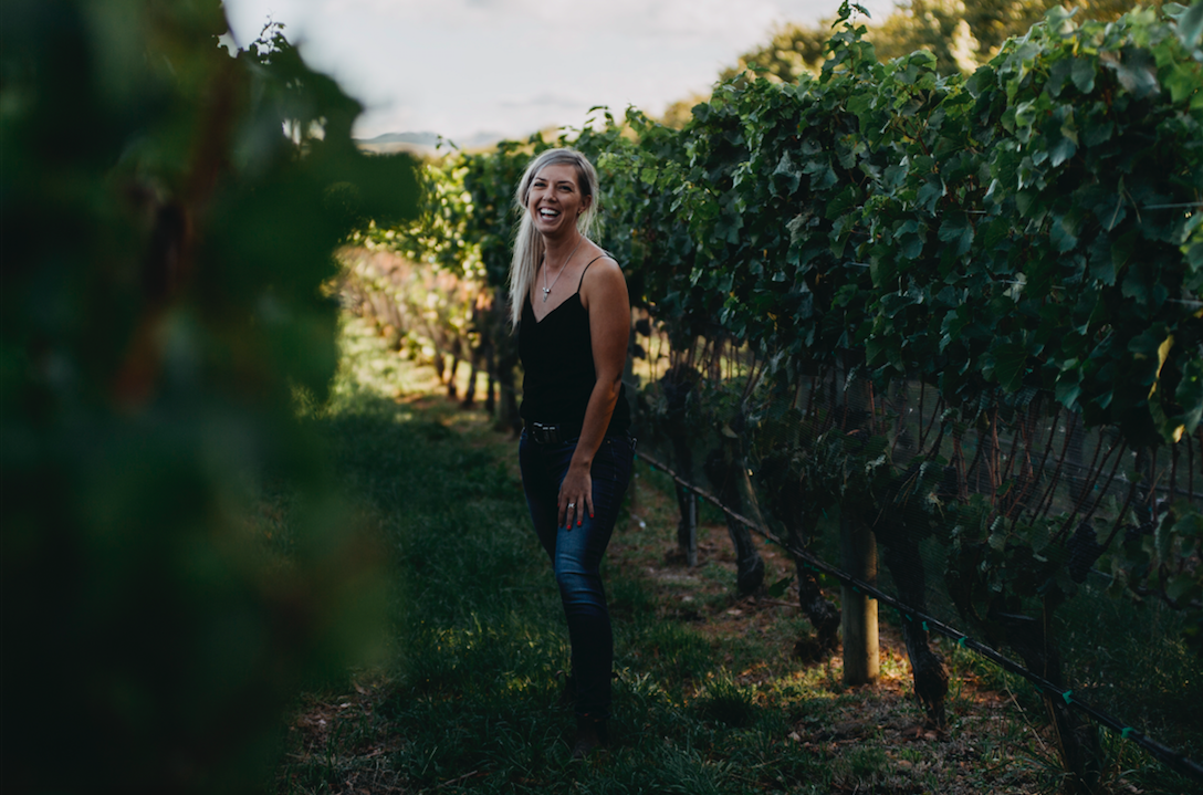 Photo of Alice in the vineyard