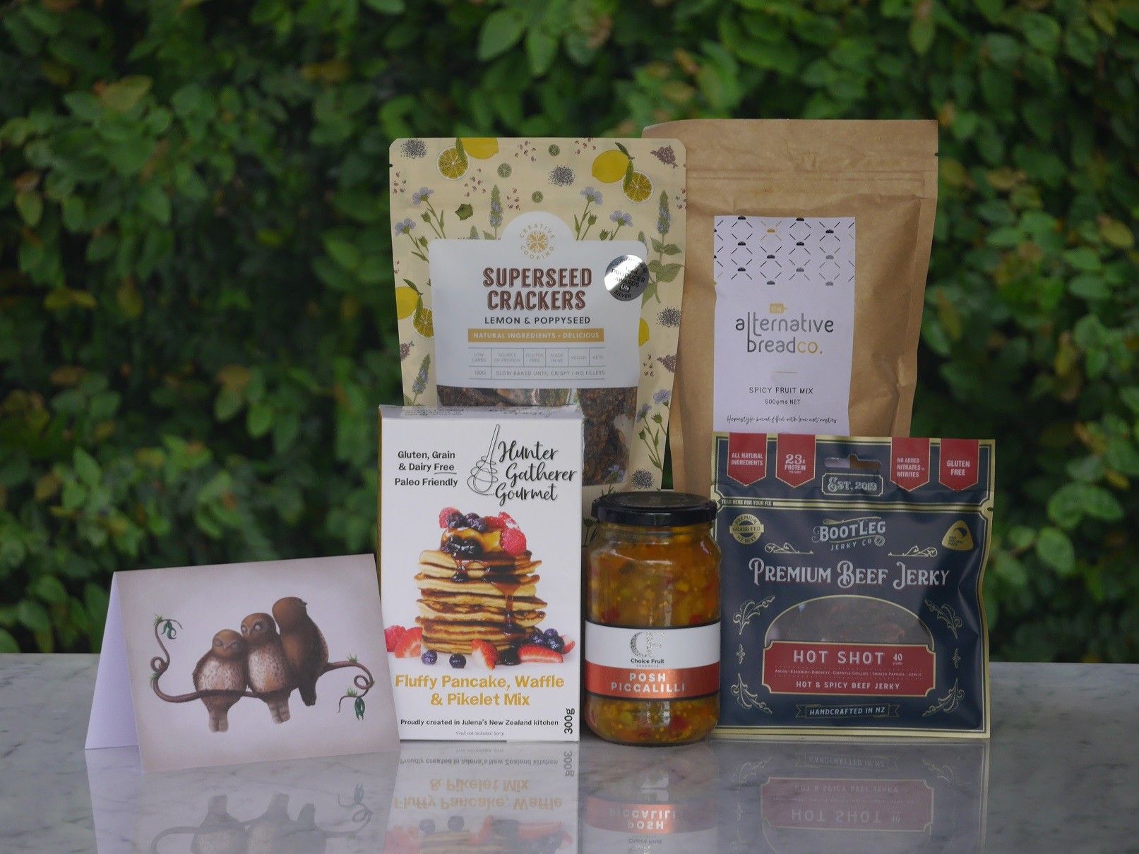 The Good Food Collective $50 Gluten free giftbox with three owls on card